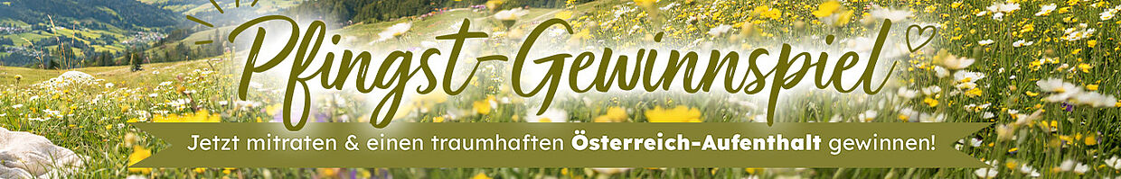 Pfingst-Gewinnspiel 2026, Blumenwiese mit Picknick-Korb