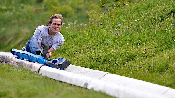 Sommer Rodelbahn Salzburger Land Junge