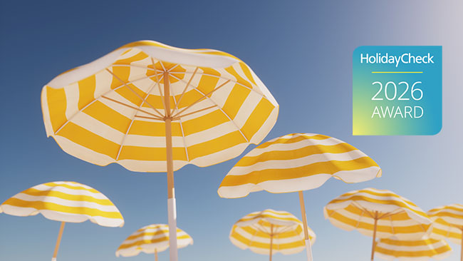 Holidaycheck Award 2026, Gelbe Sonnenschirme mit Logo Platzierung