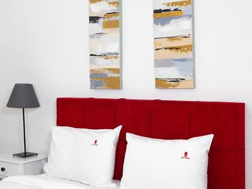 City Plaza Apartments & Rooms