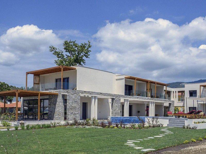 E7B9954E21A74D63AD49A33C4113E046