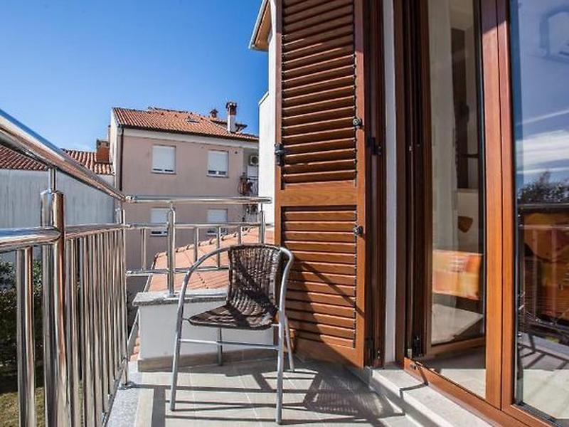 1F0AD412223C4909354F016A6DA233BE